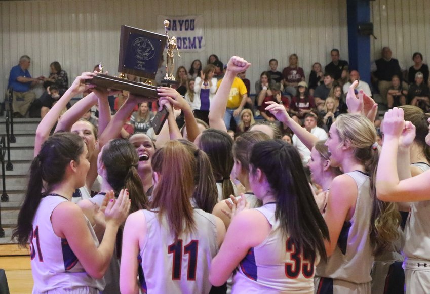 The Leake Academy girls celebrate winning the Class AAAA state championship on Saturday at Hillcrest Christian.